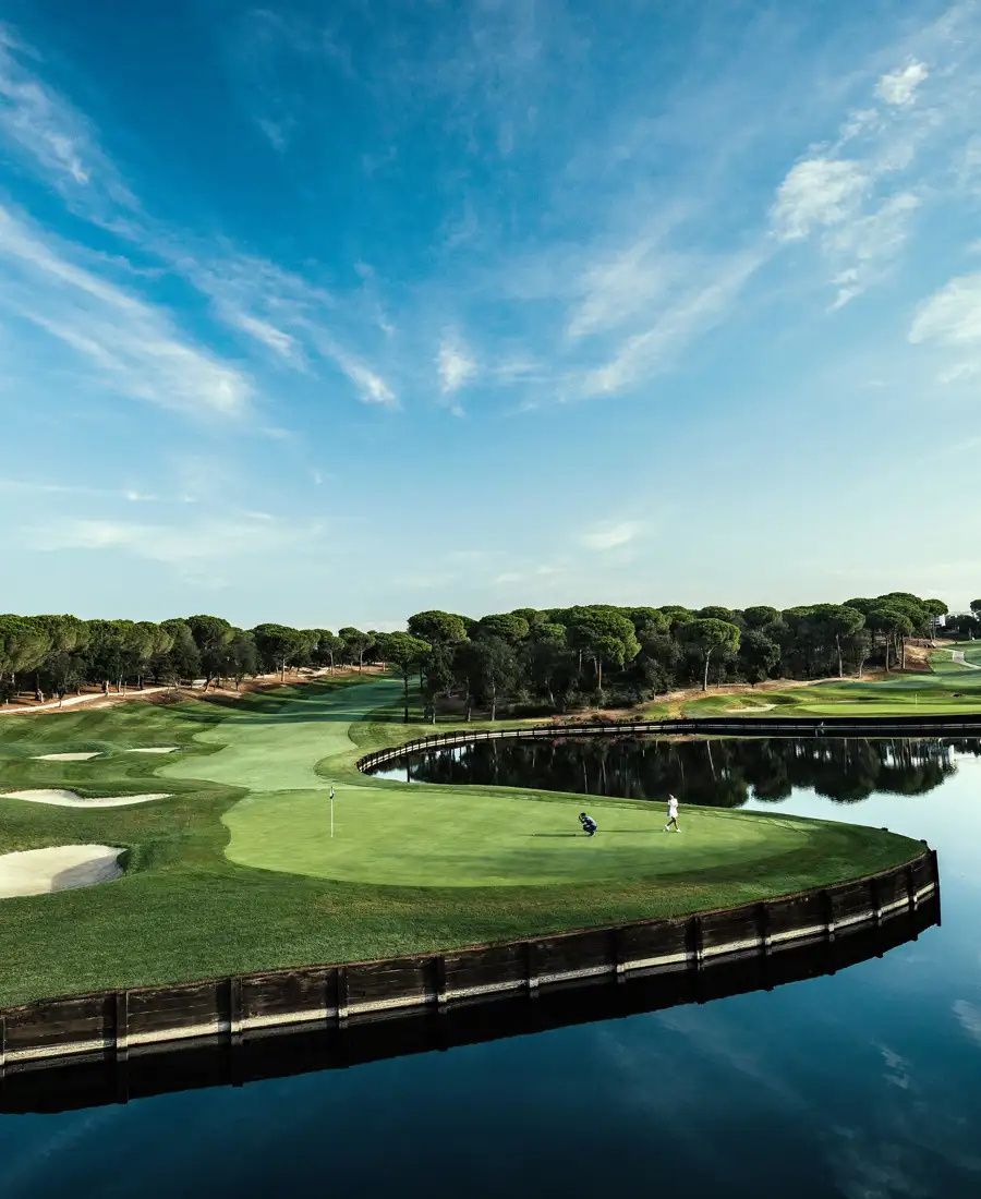 The resort's golf course and lake surrounded by pine forest