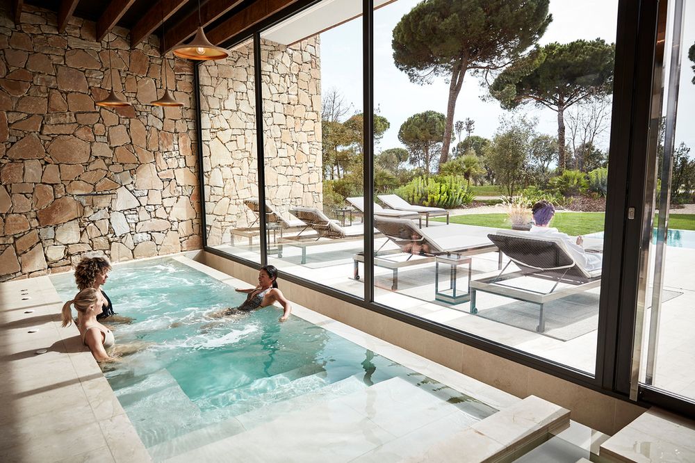 Women relaxing in the indoor hydrotherapy pool